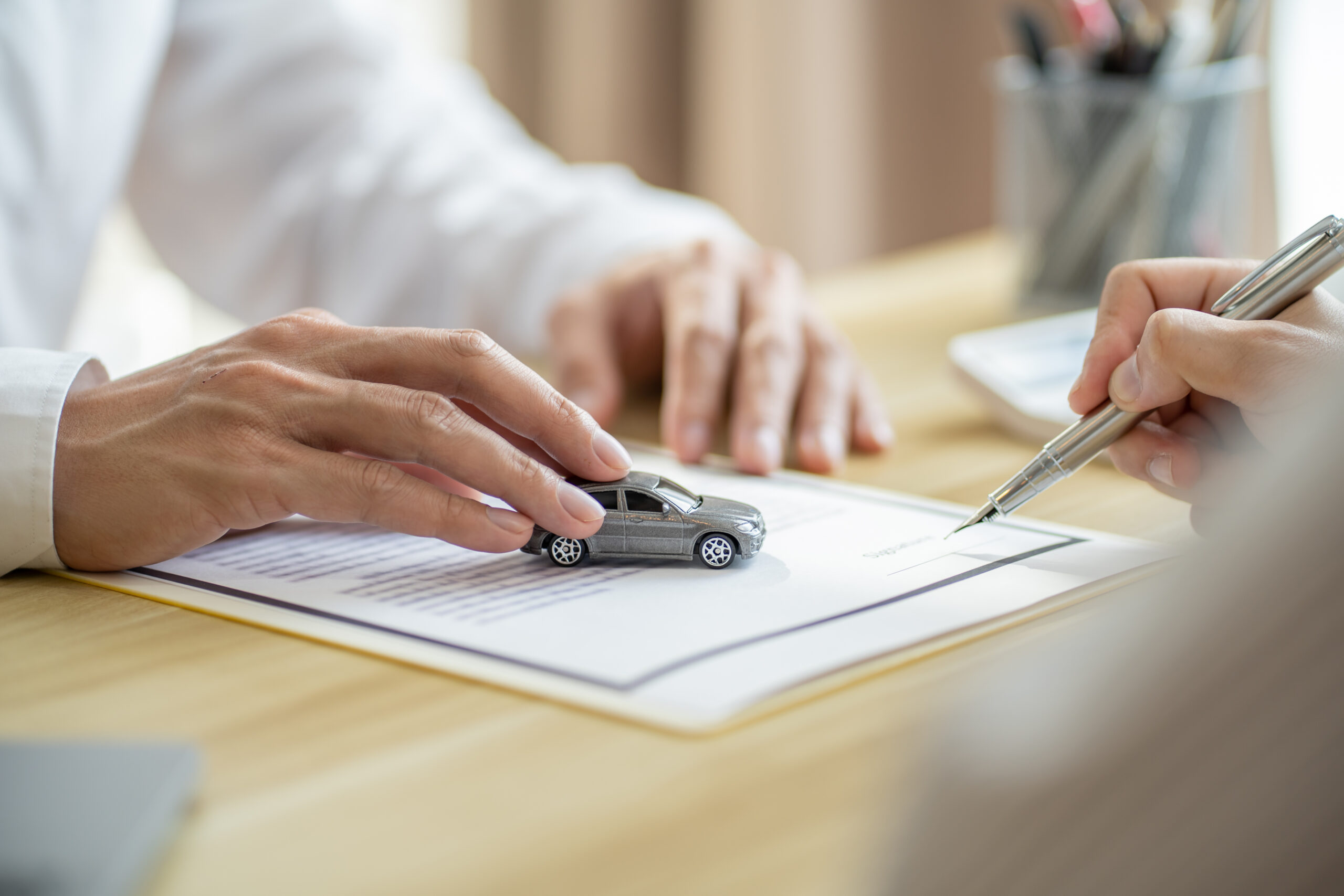 Loss Adjuster Insurance Agent Inspecting Damaged Car. .Sales manager giving advice application form document considering mortgage loan offer for car  insurance
